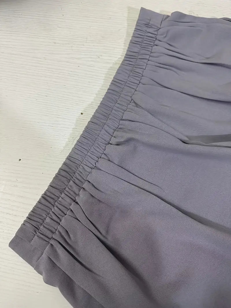 Stilvolle Weite Hose für Damen mit elastischem Bund und zwei Taschen